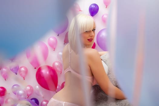 Image of pretty sexy blonde posing, turning at camera