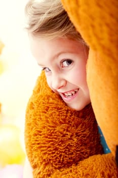 Portrait of emotional girl with teddy bear, close-up