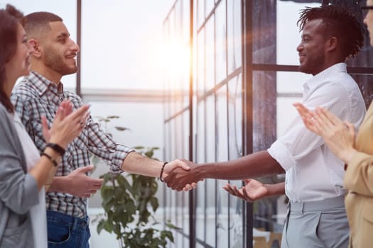 two businessman shake hand with partner to celebration partnership