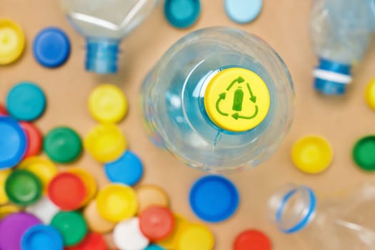 Separate garbage PET recycle plastic bottle caps recycling bottles icon recycle symbol packaging icon. Bottle cap separate waste sorting plastic cap sorting PET plastic garbage sorting used PET waste.