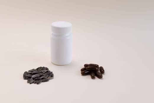 White Bottle, Container With Sunflower Lecithin Softgel Pill Capsules, Sunflower Seeds On Beige Background. Vitamin, Dietary Supplements. Copy Space For Text. Healthy Lifestyle. Horizontal Plane.