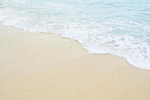 Soft wave of the sea on the sandy beach