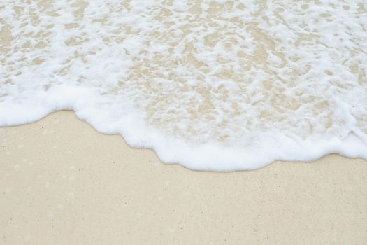 Soft wave of the sea on the sandy beach