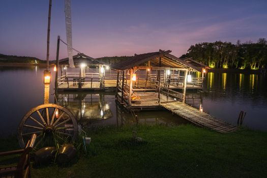 Thailand Landscape : Local tourism boat house on a river at night