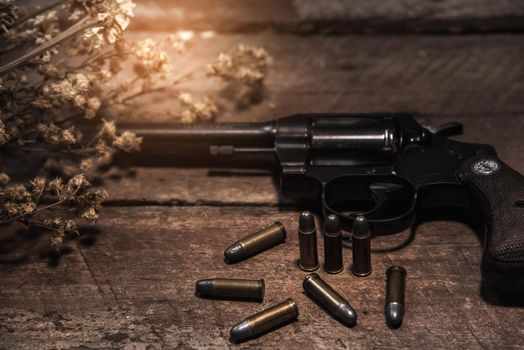 handgun bullets on wood table