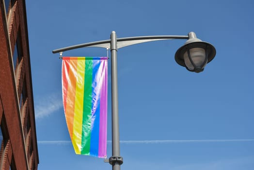 Rainbow flag LGBT on the sky