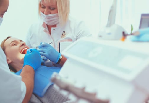 Doctor and patient in the dental clinic.