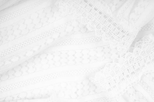White background with lace flower. Texture background pattern.