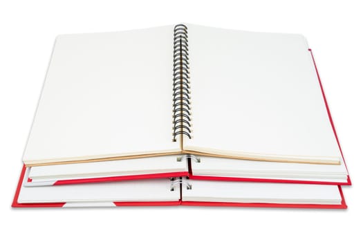 Heap of open book with blank white pages. Clipping path included.