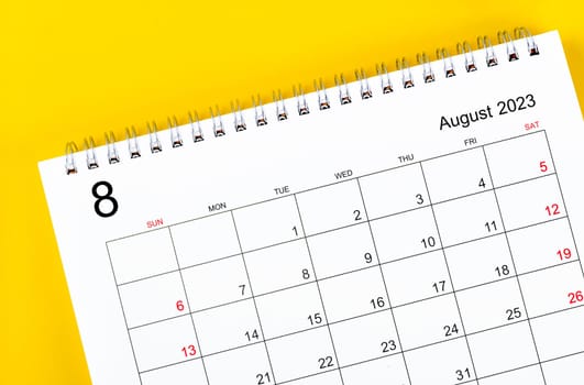 August 2023 Monthly desk calendar for 2023 year on yellow background.