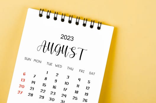 August 2023 Monthly desk calendar for 2023 year on yellow background.