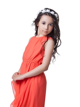 Adorable little model posing in stylish red dress, isolated on white