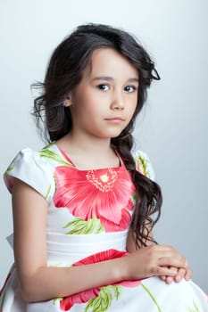 Image of charming dark-haired girl posing at camera