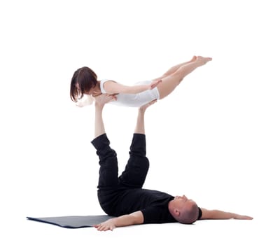Image of flexible yoga instructors practising in studio
