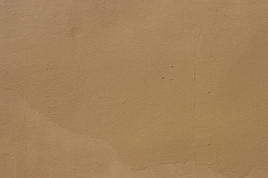 Old shabby wall painted with brown paint. ..Texture for design with copy space.