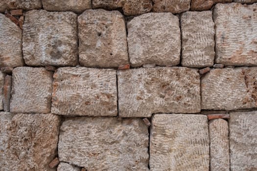 Texture of a stone wall. Old castle stone wall texture background. Stone wall as a background or texture. Part of a stone wall, for background or texture