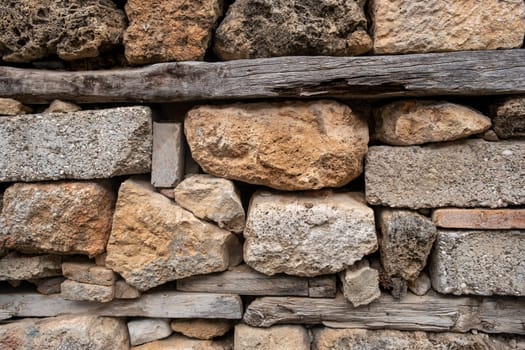 Texture of a stone wall. Old castle stone wall texture background. Stone wall as a background or texture. Part of a stone wall, for background or texture