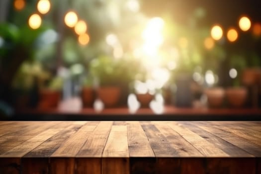 The empty wooden table top with blur background of indoor vintage cafe. Exuberant image.