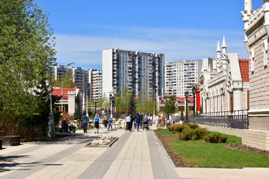 Moscow, Russia - May 11. 2021. Muscovites walk on the boulevard in Zelenograd