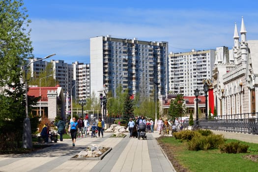 Moscow, Russia - May 11. 2021. Muscovites walk on the boulevard in Zelenograd