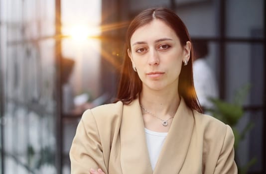 Portrait of serious attractive businesslady in office