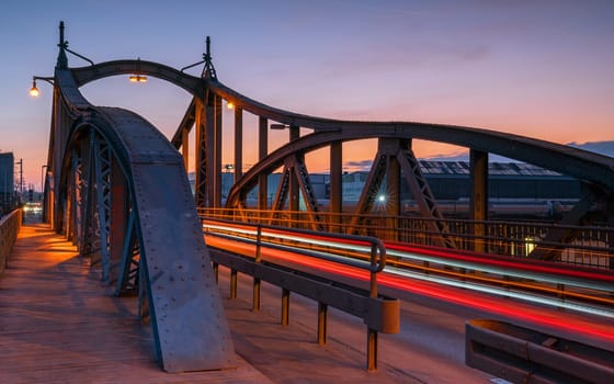 Old harbor bridge during sunset with light trails, Krefeld, North Rhine Westphalia, Germany