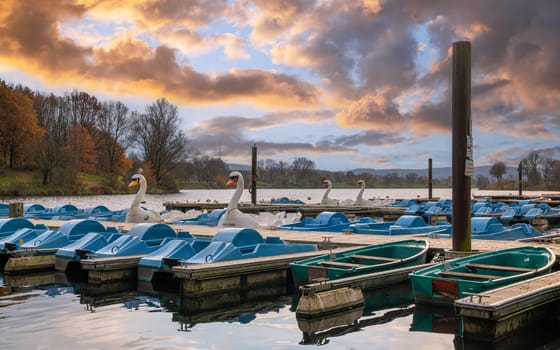 Panoramic image of paddleboats, autumn at the Kemnader lake, North Rhine Westphalia, Germany