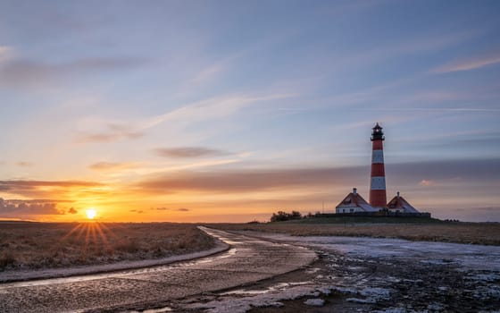 Panoramic image of Westerhever lighthouse against sky, North Frisia, Germany 