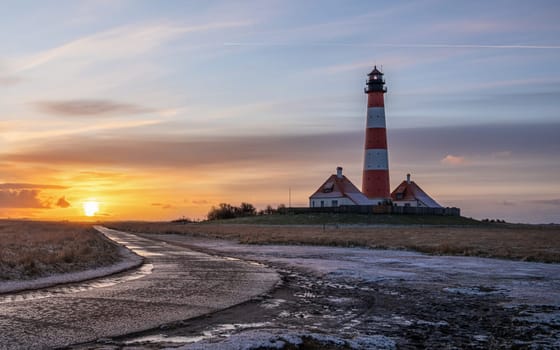 Panoramic image of Westerhever lighthouse against sky, North Frisia, Germany 