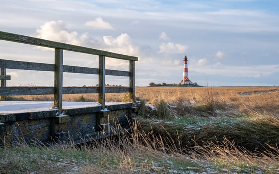 Panoramic image of Westerhever lighthouse against sky, North Frisia, Germany 