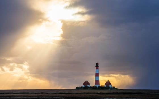 Panoramic image of Westerhever lighthouse against sky, North Frisia, Germany 