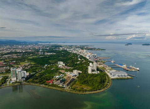 Aerial drone of Kota Kinabalu city with modern buildings. Borneo,Sabah, Malaysia.