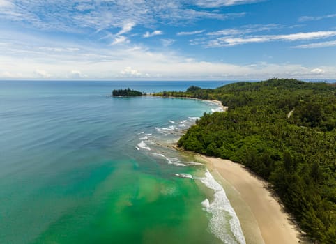 Aerial drone of tropical beach with crystal clear water in the tropics. Borneo, Malaysia.