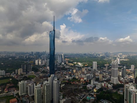 Kuala Lumpur, Malaysia - September 11, 2022: Business district of Kuala Lumpur with skyscrapers and modern buildings. Merdeka Tower.