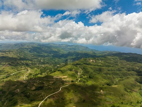Aerial view of countryside with agricultural land in the mountains. Libo hills. Cebu island, Philippines.