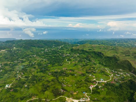 Top view of mountains and hills in the fog. Osmena Peak. Mountain landscape. Cebu Philippines.