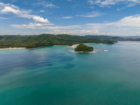 Top view of tropical beach with crystal clear water in the tropics. Sabah, Borneo, Malaysia.
