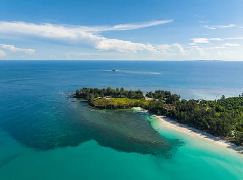 Aerial drone of Seascape with tropical sandy beach and blue ocean. The Tip of Borneo. Kalampunian Beach. Borneo, Malaysia.