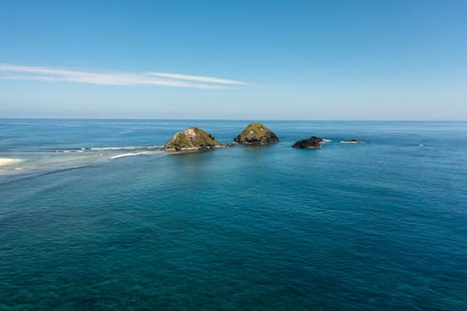 Rocky islands and blue ocean. Seascape in the Philippines.