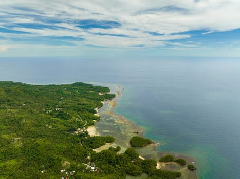 Top view of coastline of the island with jungle and beaches. Negros, Philippines