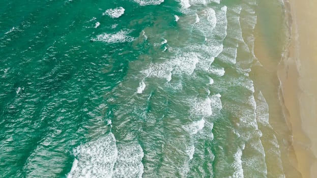 Aerial drone of sandy beach and tropical sea. Beautiful sea landscape beach. Borneo, Malaysia.
