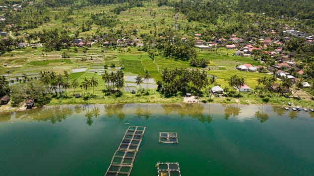 Aerial view of agriculture in Sumatra with farmland and fish farm. Sumatra. Indonesia.