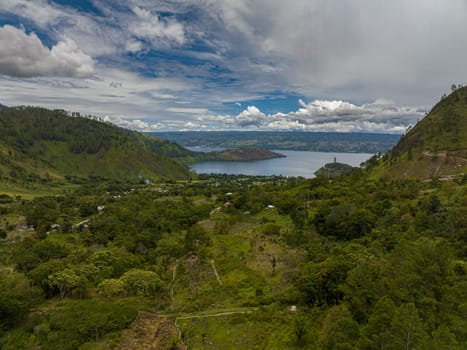 Mountains with forest and Lake Toba. Samosir Island. Sumatra, Indonesia.