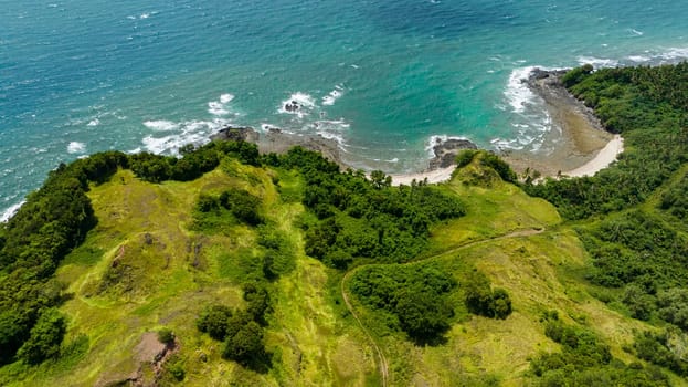 Coast of Borneo island and sea surf. Sabah, Malaysia.