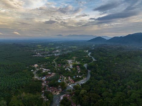 Aerial drone of valley among the jungle and rainforest. Bukit Lawang. Sumatra. Indonesia.