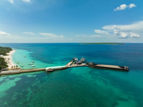 Sea port and ships on a tropical island. Bantayan island, Philippines.