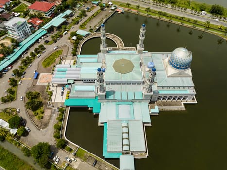 Aerial view of beautiful city mosque Bandaraya in the city of Kota Kinabalu. Sabah, Borneo. Malaysia.