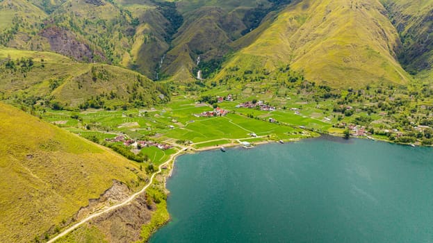 Aerial view of Farmland in a mountain valley on Lake Toba. Sumatra, Indonesia.