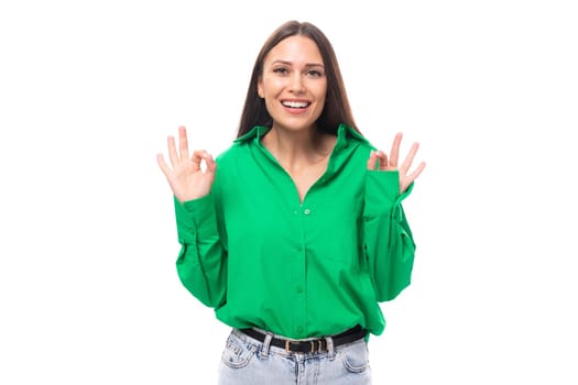 young european brunette woman with brown eyes in green blouse isolated on white background with copy space.