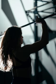 Athletic Beautiful Woman with barbell, Bodybuilding Gym Training Routine